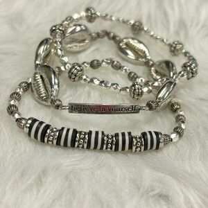 Handcrafted Silver toned stackable bracelets w/ Cowrie shells
